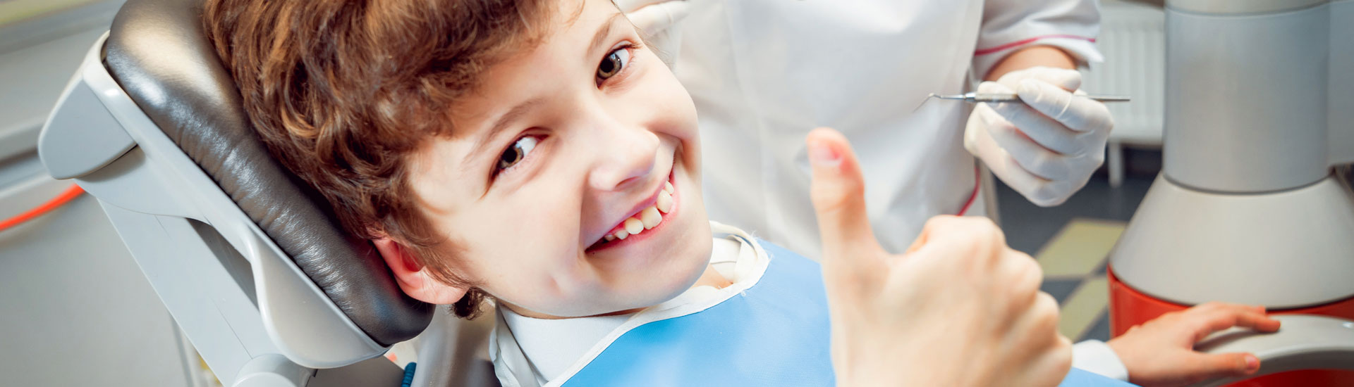 Little Boy Smiling During  a Checkup in a Dental Clinic